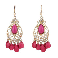 Cargar imagen en el visor de la galería, Brass Ohrringe golden Schnörkel oval Stein pink weiß Schleifen - chic-net.de
