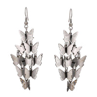 Load image into Gallery viewer, Brass Ohrringe silberfarben lang kleine Schmetterlinge Anhänger - chic-net.de
