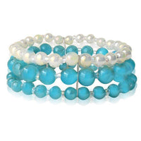 Load image into Gallery viewer, Glasperlen Armband türkis weiß gold dreilagig Perlen Gummiband verstellbar Perlenarmbänder - chic-net.de
