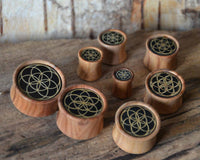 Load image into Gallery viewer, Olivenholz Horn Inlay Flesh Plug Blume des Lebens - chic-net.de
