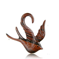 Load image into Gallery viewer, Piercing Narra Holz Schwalbe Plug Ohrstecker Expander handgeschnitzt gemasert - chic-net.de
