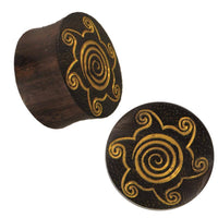 Load image into Gallery viewer, Plug Holz braun Lasergravur goldfarben Tribal Spiralen Sonne Piercing - chic-net.de

