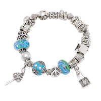 Load image into Gallery viewer, White Brass Perlen Armband Glas Emaille Blume türkis grün Eule Schlüssel verstellbar - chic-net.de
