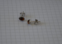 Load image into Gallery viewer, Ohrstecker 925 Sterling Silber mit Tigerauge oval 7mm
