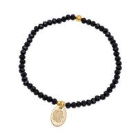 Load image into Gallery viewer, Perlenarmband Brass golden schwarz facettiert oval Krone Charm verstellbar - chic - net.de
