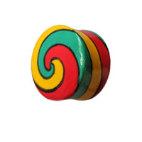 Load image into Gallery viewer, A unisex teak wood ear plug, painted with a green, red, and yellow spiral pattern in a tribal style, inspired by Reggae Schmuck. The sides alternate between yellow, red, and green.
